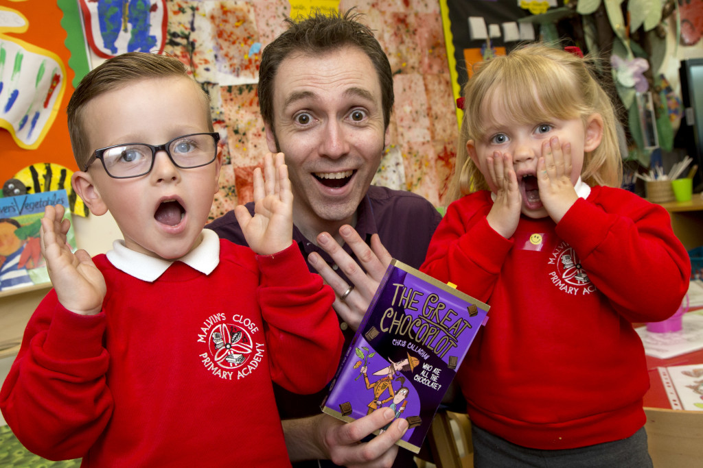 Malvin's Close nursery pupil Charlie, author Chris Callaghan and Paige