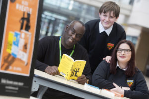author-alex-wheatle-with-student-library-assistants-thomas-nichol-and-amy-langdown
